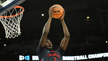 Mar 21, 2024; Omaha, NE, USA;  Duquesne Dukes forward David Dixon (2) grabs a second half rebound against the Brigham Young Cougars during the first round of the NCAA Tournament at CHI Health Center Omaha. Mandatory Credit: Steven Branscombe-USA TODAY Sports