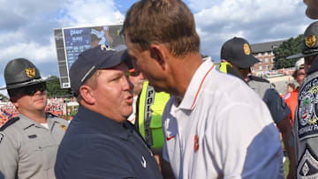 Sep 9, 2023; Clemson, South Carolina, USA;  Charleston Southern head coach Gabe Giardina and Clemson head coach Dabo Swinney shake hands after the game with Charleston Southern at Memorial Stadium. Mandatory Credit: Ken Ruinard-Imagn Images