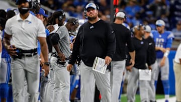 Detroit Lions offensive line coach Hank Fraley watches action from sideline against the Buffalo Bills during the first half of the preseason game at Ford Field in Detroit on Friday, Aug. 13, 2021.