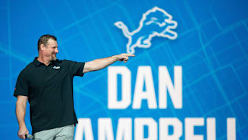 Head Coach Dan Campbell stands on stage during the Detroit Lions new uniform reveal event inside Ford Field in Detroit on Thursday, April 18, 2024.