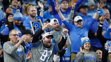 Lions fans react to a play in the first half against the L.A. Rams at Ford Field in Detroit on Sunday, Jan. 14, 2024.