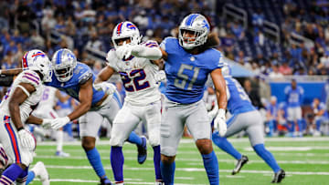 Detroit Lions linebacker Jahlani Tavai defends against Buffalo Bills running back Matt Breida (22) during the first half of the preseason game at Ford Field in Detroit on Friday, Aug. 13, 2021.