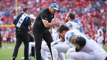 Detroit Lions head coach Dan Campbell shakes hand with center Frank Ragnow (77) during warm up ahead of the season opener against the Kansas City Chiefs at Arrowhead Stadium in Kansas City, Mo. on Thursday, Sept. 7, 2023.