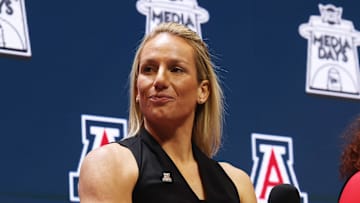 Oct 21, 2025; Kansas City, MO, USA; Arizona head coach Becky Burke speaks to media during Big 12 Womenís Basketball Media Day at T-Mobile Center. Mandatory Credit: Sophia Scheller-Imagn Images
