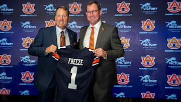 Auburn Tigers football coach Hugh Freeze and athletic director John Cohen pose for photos during Freeze   s introduction at the Woltosz Football Performance Center in Auburn, Ala., on Tuesday, Nov. 29, 2022