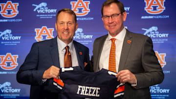 Auburn Tigers football coach Hugh Freeze and athletic director John Cohen pose for photos during Freeze's introduction at the Woltosz Football Performance Center.
