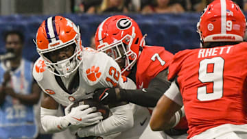 Georgia Bulldogs DB Daniel Harris making a tackle against Clemson as two South Carolina football rivals faced off in week 1