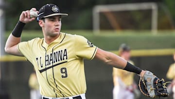 TL Hanna High's Will Craddock (9) warms up before the game with JL Mann High School in Anderson, S.C. Friday, April 11, 2025.
