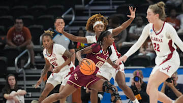 Florida State Seminoles guard Ta'Niya Latson (00) dribbles toward the basket as Alabama takes on Florida State in round one of the NCAA women's basketball tournament at the Moody Center in Austin Friday, March 22, 2024.