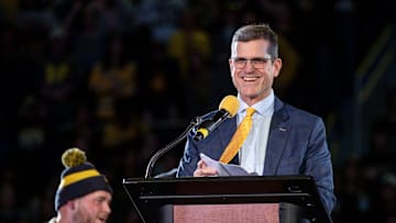 Michigan head coach Jim Harbaugh speaks during the national championship celebration at Crisler