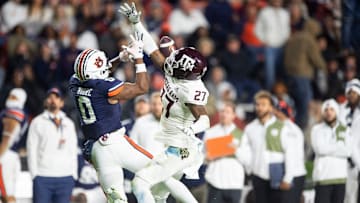 Texas A&M Aggies defensive back Antonio Johnson (27) is called for pass interference on Auburn Tigers wide receiver Koy Moore (0) as Auburn Tigers take on Texas A&M Aggies at Jordan-Hare Stadium in Auburn, Ala., on Saturday, Nov. 12, 2022.