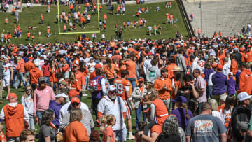 Clemson fans run on the field for meet me at the paw after the Spring football game in Clemson, S.C. Saturday, April 6, 2024.