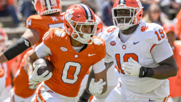 Clemson wide receiver Antonio Williams(0) runs near Clemson defensive lineman DeMonte Capehart (19) during the Spring football game in Clemson, S.C. Saturday, April 6, 2024.