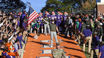 Nov 23, 2024; Clemson, South Carolina, USA; Clemson Tigers players get ready to run down the hill on Military Appreciation Day and Senior Day before a game against The Citadel Bulldogs at Memorial Stadium. Mandatory Credit: Ken Ruinard-Imagn Images