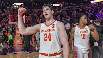 Feb 27, 2024; Clemson, South Carolina, USA; Clemson junior forward PJ Hall (24) and RJ Godfrey (10) celebrate a win. 