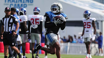 Detroit Lions running back Jahmyr Gibbs makes a catch during joint practice with New York Giants at Detroit Lions headquarters and training facility in Allen Park on Tuesday, August 8, 2023.