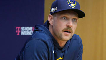 Milwaukee Brewers Rhys Hoskins answers a question during a press conference before the Tuesday Milwaukee Brewers National League Wild Card playoff series at American Family Field in Milwaukee on Monday, Sept. 30, 2024.