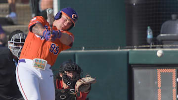Clemson sophomore Collin Priest (99) bats against University of Louisville during the bottom of the fourth inning at Doug Kingsmore Stadum in Clemson, S.C. Friday, April 18, 2025.