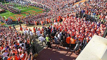 Clemson players run down the hill before the game with UNC, during senior day ceremonies, Nov 18, 2023; Clemson, South Carolina, USA; at Memorial Stadium.
