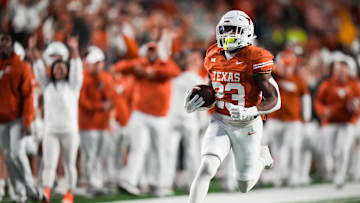 Texas running back Jaydon Blue runs the ball in to score a touchdown