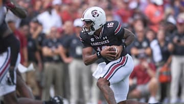 Sep 14, 2024; Columbia, South Carolina, USA; South Carolina Gamecocks quarterback LaNorris Sellers (16) scores against the LSU Tigers during the first quarter at Williams-Brice Stadium. Mandatory Credit: Ken Ruinard/USA TODAY Network via Imagn Images