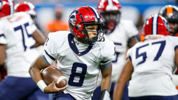 Southfield A&T quarterback Isiah Marshall runs against Belleville during the second half of the Division 1 state final at Ford Field in Detroit on Sunday, Nov. 26, 2023.