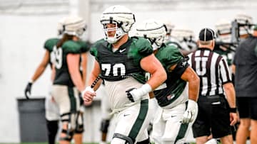 Michigan State's Luke Newman works out during camp on Monday, Aug. 5, 2024, at the indoor practice facility in East Lansing.