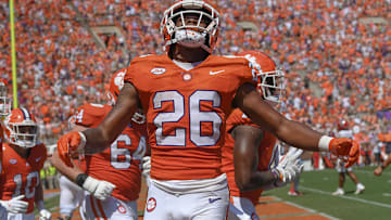 Clemson Tigers running back Jay Haynes celebrates scoring a touchdown against the North Carolina State Wolfpack.