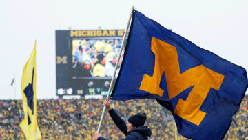 Michigan spirit squad celebrates a touchdown against Ohio State during the first half at Michigan Stadium in Ann Arbor on Saturday, Nov. 27, 2021.

michigan football stock u-m logo, Michigan flag, Michigan banner