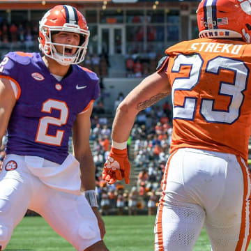 Clemson quarterback Cade Klubnik (2) reacts after Clemson running back Peyton Streko (23) ran in a touchdown during the Spring football game in Clemson, S.C. Saturday, April 6, 2024.