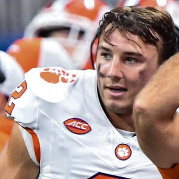 Aug 31, 2024; Atlanta, Georgia, USA; Clemson Tigers quarterback Cade Klubnik (2) and head coach Dabo Swinney react after Klubnik threw an interception against Georgia Bulldogs during the fourth quarter of the 2024 Aflac Kickoff Game at Mercedes-Benz Stadium. 