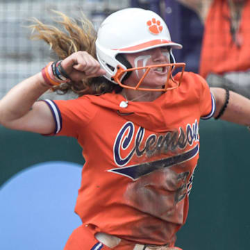 Clemson senior Maddie Moore (28) celebrates scoring against USC Upstate during the bottom of the fifth inning of the NCAA Softball Tournament Clemson Regional at McWhorter Stadium in Clemson Friday, May 16, 2025.