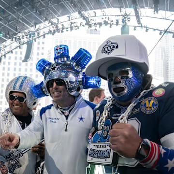 Dallas Cowboys fans pose in the main theater on Thursday, April 25, 2024 for the first day of the NFL Draft in Detroit.