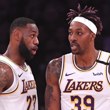 Jan 5, 2020; Los Angeles, California, USA;  Los Angeles Lakers forward LeBron James (23) talks with center Dwight Howard (39) after a pass resulted in a basket and foul in the first half against the Detroit Pistons at Staples Center. Mandatory Credit: Jayne Kamin-Oncea-USA TODAY Sports