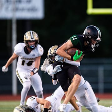 Luke Garvin (14) and Fossil Ridge lost to Columbine 35-21 on Thursday, Sept. 12, 2024.