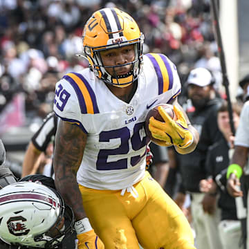 LSU freshman Caden Durham (29) runs at South Carolina on Saturday. Durham prepped at Duncanville High School and was SBLive's first team all-Texas running back in 2023.