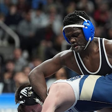 Dunia Sibomana-Rodriguez from Long Beach wrestles Cooper Merli from Newburgh Free Academy in the 116-pound Division I championship match at the NYSPHSAA Boys Wrestling Championships at MVP Arena in Albany on Saturday, March 1, 2025.