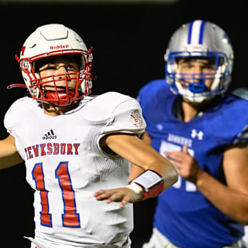 Tewksbury quarterback Vincent Ciancio looks to make a pass during a football game versus Danvers at Danvers High School on Friday, Sept. 9, 2022. Tewksbury defeated Danvers 35-21.

8048753001p Dan Football8ds