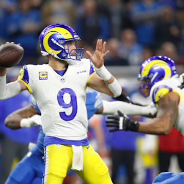 L.A. Rams quarterback Matthew Stafford looks to throw the ball in the first half against the Detroit Lions at Ford Field in Detroit on Sunday, Jan. 14, 2024.