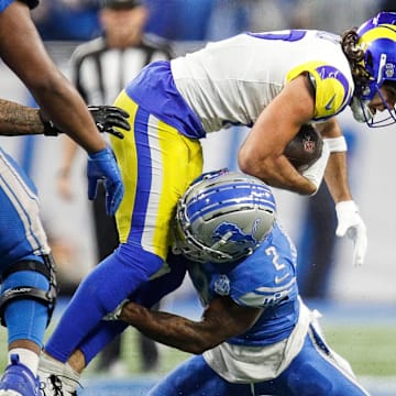 Detroit Lions safety C.J. Gardner-Johnson (2) tackles L.A. Rams wide receiver Puka Nacua (17) during the second half of the NFL wild-card playoff game at Ford Field in Detroit on Sunday, Jan, 14, 2024.