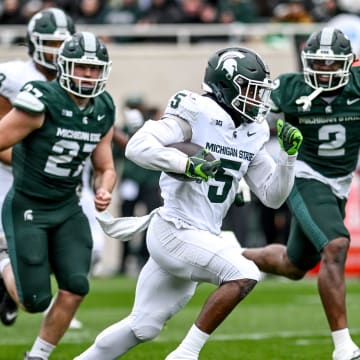 Michigan State's Nathan Carter runs for a touchdown during the Spring Showcase on Saturday, April 20, 2024, at Spartan Stadium in East Lansing.