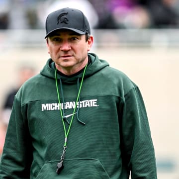 Michigan State's head coach Jonathan Smith walks to the sideline during the Spring Showcase on Saturday, April 20, 2024, at Spartan Stadium in East Lansing.