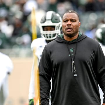 Michigan State's assistant head coach Keith Bhonapha works with the running backs during the Spring Showcase on Saturday, April 20, 2024, at Spartan Stadium in East Lansing.