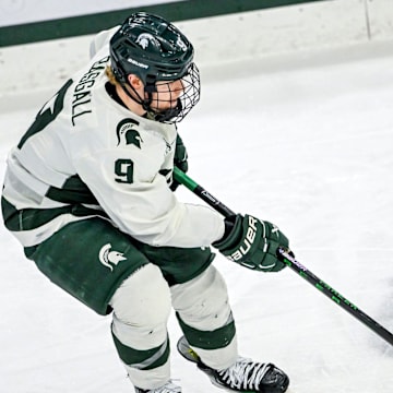 Michigan State's Matt Basgall moves the puck against Minnesota during the first period on Saturday, Jan. 25, 2025, at Munn Arena in East Lansing.