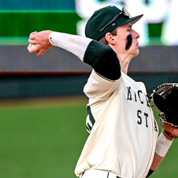 Michigan State's Randy Seymour fields a ball hit by the Lugnuts in the first inning on Tuesday, April 1, 2025, during the Crosstown Showdown at Jackson Field in Lansing.