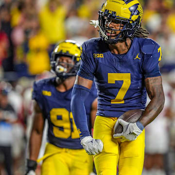 Michigan defensive back Makari Paige (7) runs through the end zone after he thought he made an interception against Fresno State during the second half at Michigan Stadium in Ann Arbor on Saturday, Aug. 31, 2024.