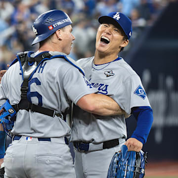 Dodgers catcher Will Smith and pitcher Yoshinobu Yamamoto celebrate the final out of Game 7 of the 2025 World Series.