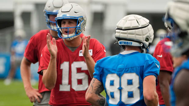 Detroit Lions quarterback Jared Goff encourages his team  