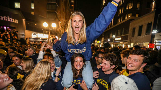 Michigan Wolverine fans take to the streets to celebrate their win at the College Football Playoff national championship 