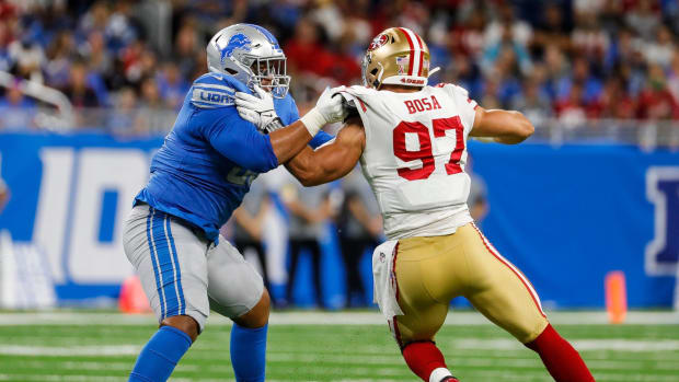 Detroit Lions offensive tackle Penei Sewell tries to stop San Francisco 49ers defensive end Nick Bosa during the first half a